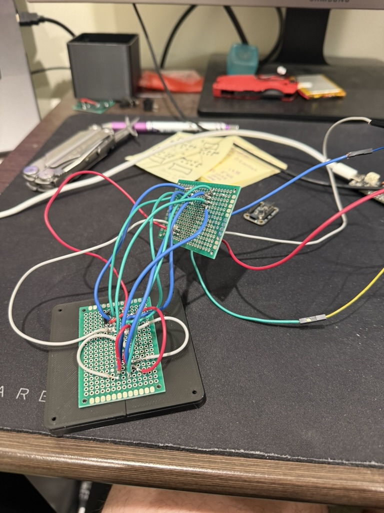 prototype wiring — protoboard mux breakout with 4× OLEDs on jumper wires
